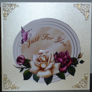 Antique Roses on a Round Stepped Plaque by Ine Moren