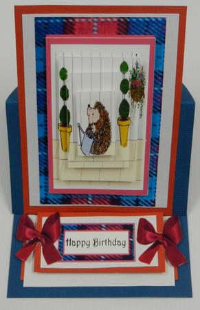 Spike in the Garden Pyramid with Tartan Background by Irene Drieman
