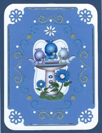 Blue Birds in a Bird Bath with Flowers by Irene Jardine