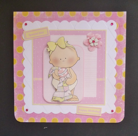 Baby Girl with Her Rattle and Comfort Blanket by Jayne Jones