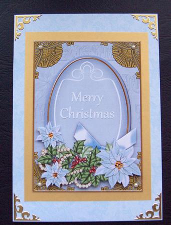 Pastel Blue Poinsettia Merry Christmas Oval 7x5in Topper by Jayne Jones
