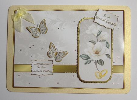 White Mangolias & Butterfly Diamond Wedding by Jayne Jones