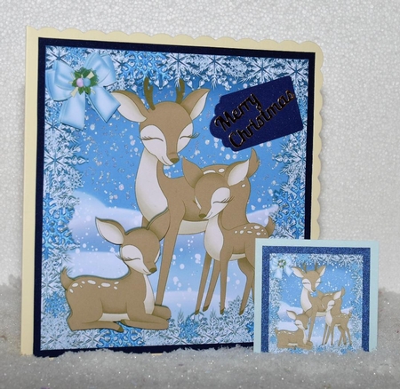 Lovely family of reindeers in the snow with bow 8x8 by Jackie Bullock