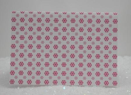 Pink Snowflakes Background by Jackie Bullock