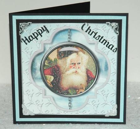 Faux Aperture & Pendant Santa Claus Topper by Jackie Bullock