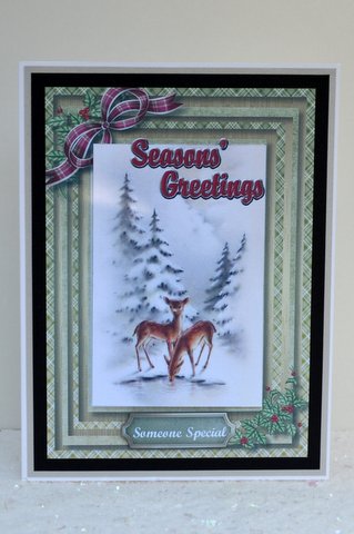Christmas Deer Having a Drink by Jackie Bullock