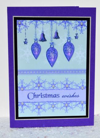 Purple Baubles and Snowflakes by Jackie Bullock