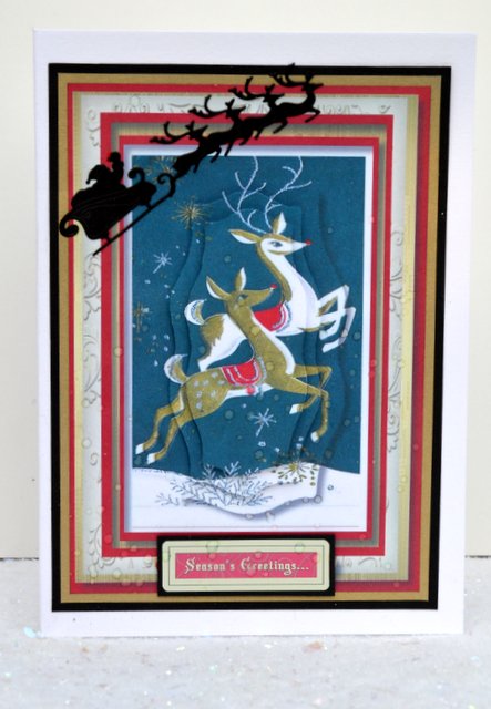 Lovely Prancing Reindeers Pyramid by Jackie Bullock