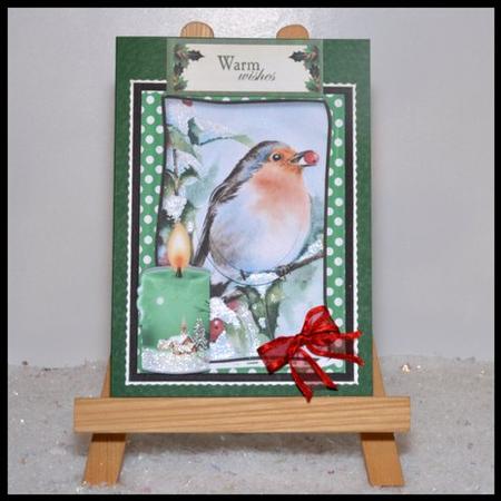 A Lovely Robin with Red Berries in the Snow Oval Pyramids by Jackie Bullock