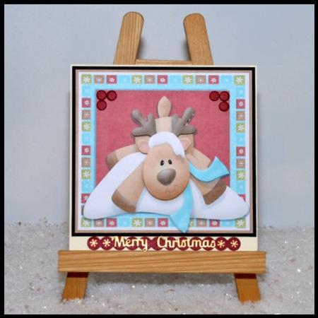 Reindeer Laying in the Snow 8x8 by Jackie Bullock
