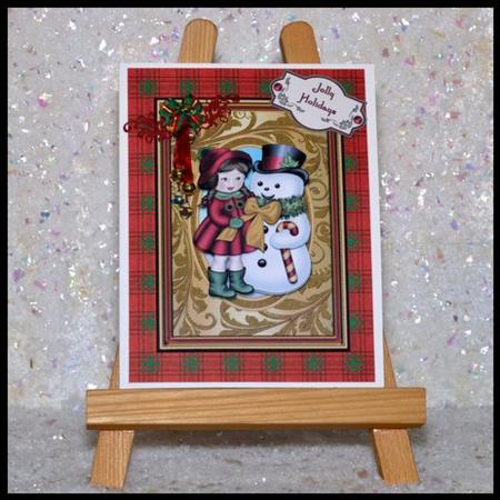 Girl with Snowman Gold 7 x 5 Card Front by Jackie Bullock