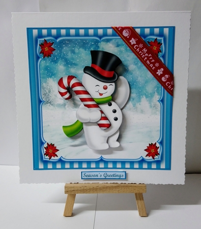 Snowman and candy cane  by Jackie Odonnell