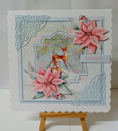 Reindeer in the snow 7x7 card by Jackie Odonnell