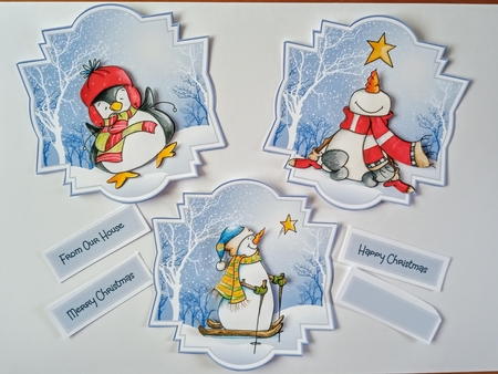 Snowman and penguin toppers by Jackie Odonnell