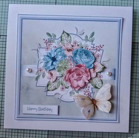 Mixed flowers and butterfly 7x7 by Jackie Odonnell