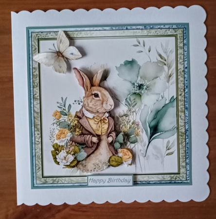 Smart hare or rabbit with flowers 7x7 by Jackie Odonnell