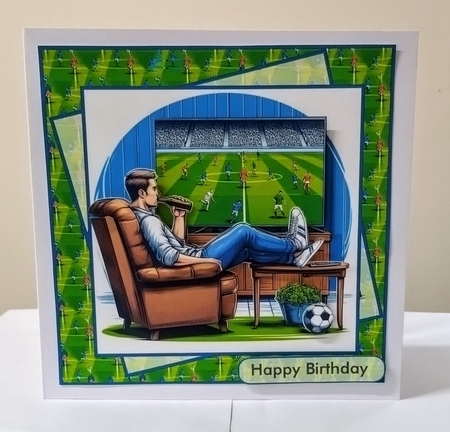Footy and a beer by Jackie Odonnell