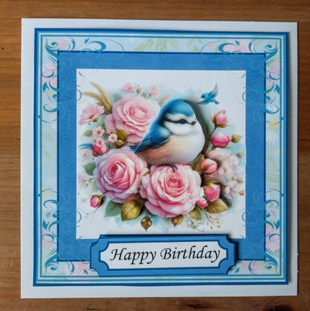 A Bird in the Rose Bush by Jackie Odonnell