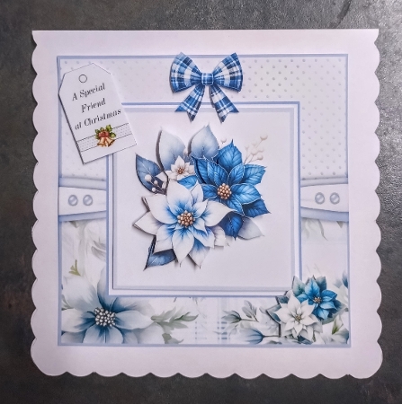 Elegant Blue Poinsettias by Jackie Odonnell