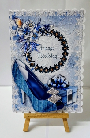 Shoes, Present, Butterfly and Winter Flowers Birthday Card by Jackie Odonnell