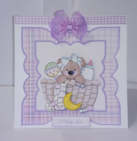 Baby Girl Bear in a Basket Card Front by Jackie Odonnell