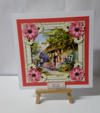 New Home Cottage in wooden frame & flowers by Jackie Odonnell