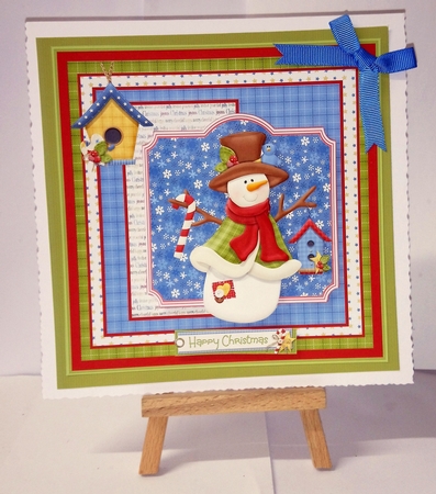 Happy snowman and birdhouse by Jackie Odonnell