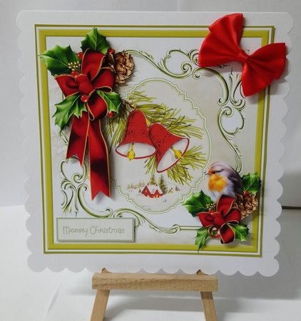 Christmas bells and holly by Jackie Odonnell