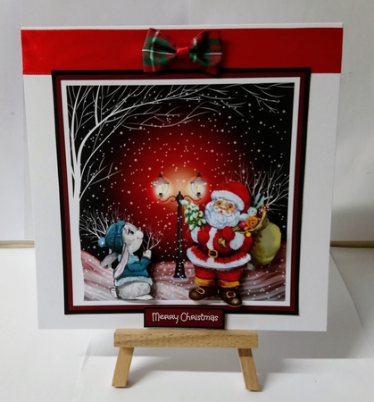 Santa and his helper by Jackie Odonnell