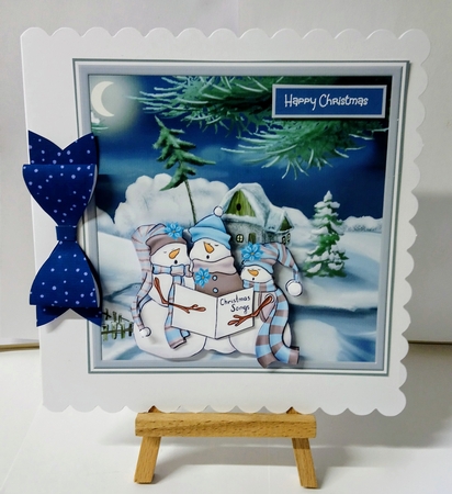 Snowmen carol singers by Jackie Odonnell
