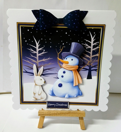 Snowman and rabbit by Jackie Odonnell