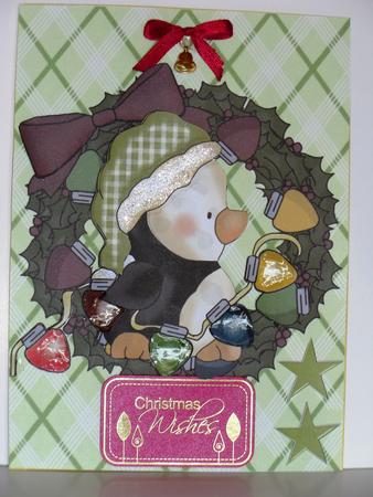 Christmas Penguin with Green Hat in Holly Wreath by Jane Hamilton