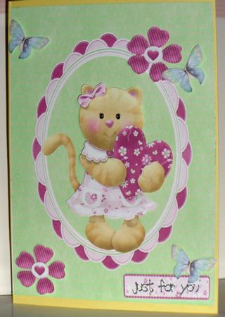Cute Bear Clutching a Heart on Green Backing Paper by Jane Hamilton