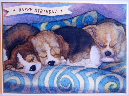 Beagle Puppies Asleep on the Sofa by Jane Wells