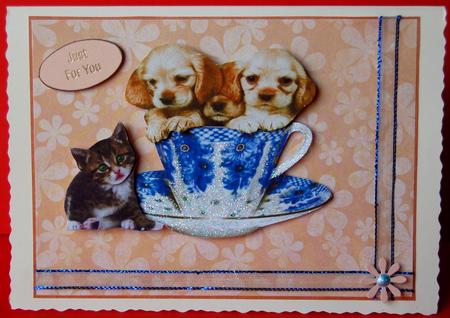 Cute Little Puppies in a Teacup with Kitten by Jane Wells