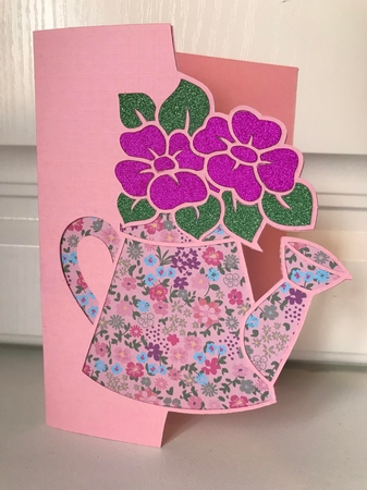OVER THE EDGE WATERING CAN by Jane Amber