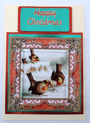 Christmas Robins Tug of Love Spiral Edge Stacker Card Front by Janet Maureen Harvey