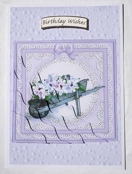 Flower Filled Wheelbarrow Wavy Corner Side Stacker by Janet Maureen Harvey