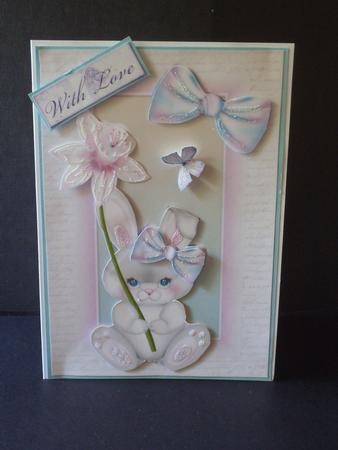 Cute Bunny Holding a Pink Daffodil by Jan Fisher