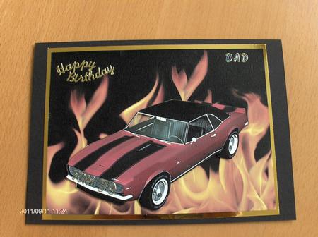 Red Sports Car on Flame Background by Janice Thomson