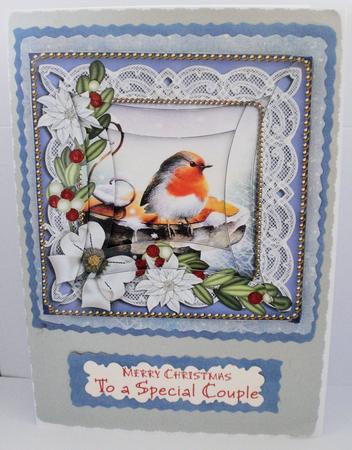 Blue Robin Poinsettia 5in Round Spiral Edge Stacker by Jayne Smith