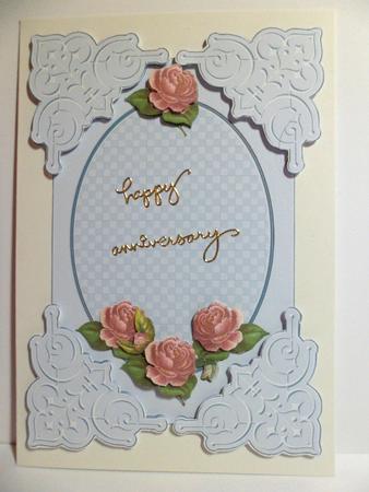 Embossed Blue Corners Rose Card Front by Jean-Marie Penny