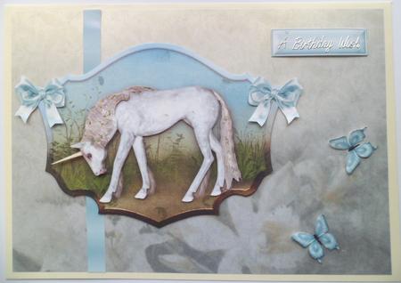White Unicorn in the Meadows with Bows by Jean-Marie Penny