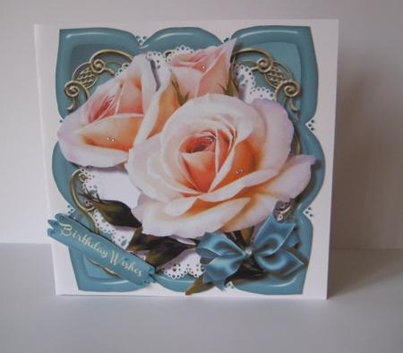 Beautiful Roses on a Teal Topper  by Jean Shevill-
