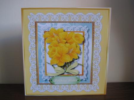 Lovely Daffodils on Lace and .gold by Jean Shevill-