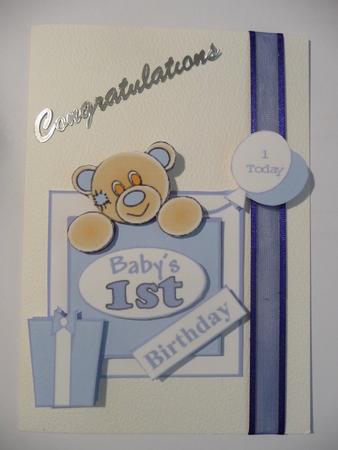 Babys First Birthday Square Toppers Blue by Jennie Ingersent