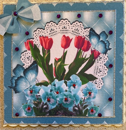 Pretty pink tulips and turq pansies with butterflies on lace in ornate frame 8x8 by Jennie Settle