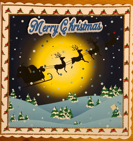 silhouette of santa and his sleigh flying 7x7 with pyramids by Jennie Settle