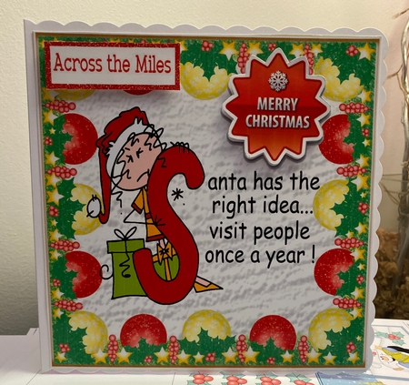 Cheeky elf with verse in bauble frame 8x8 by Jennie Settle