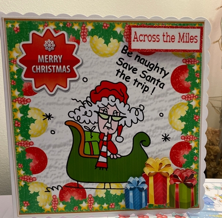  Stella in a sleigh  with presents in bauble frame 8x8 by Jennie Settle